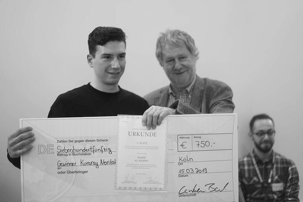 Der Gewinner von Level 2 Majed Al Hamwi zusammen mit Jochen Peters